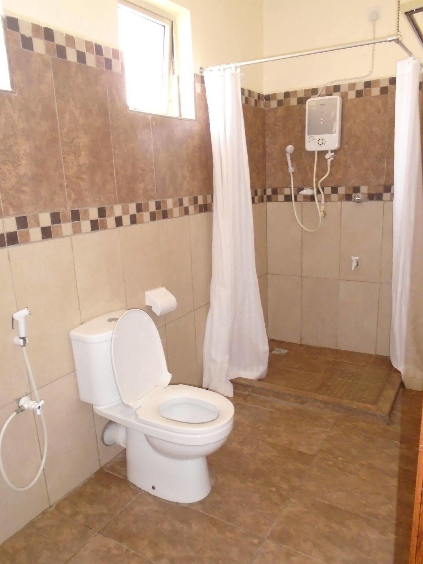 Pawenzi Serviced Apartments Момбаса Экстерьер фото