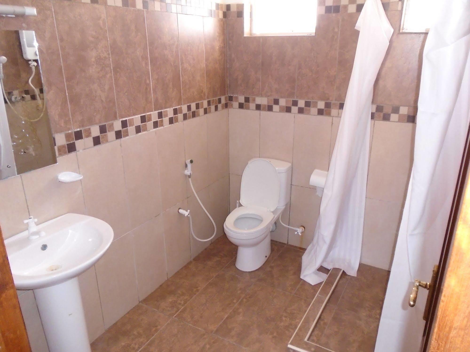 Pawenzi Serviced Apartments Момбаса Экстерьер фото
