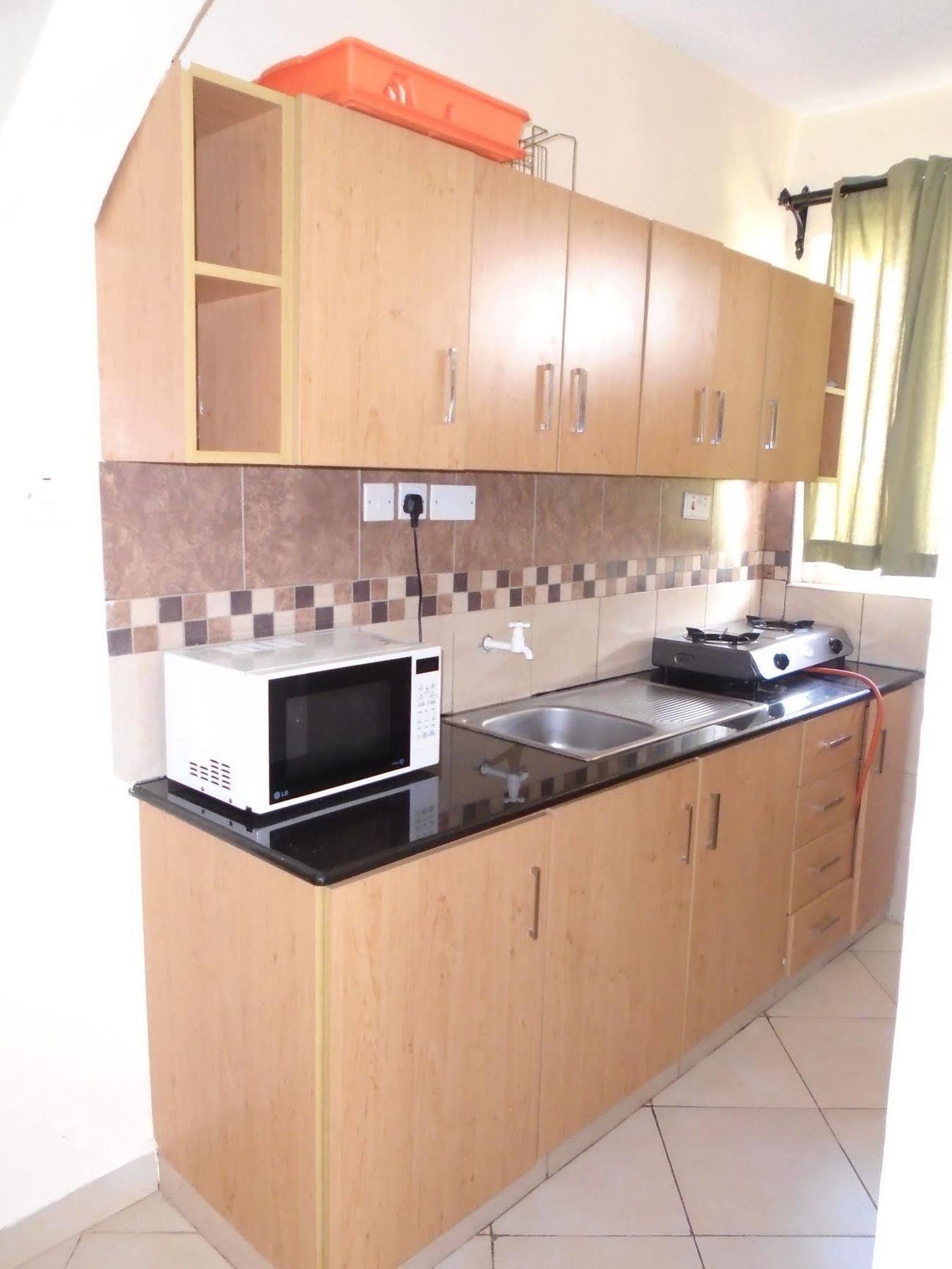 Pawenzi Serviced Apartments Момбаса Экстерьер фото